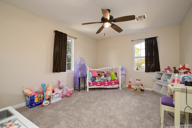 bedroom with carpet flooring and ceiling fan