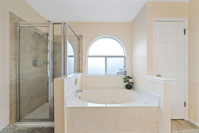 bathroom with independent shower and bath