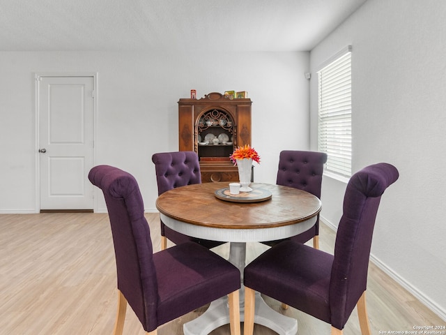 dining room featuring light wood-type flooring