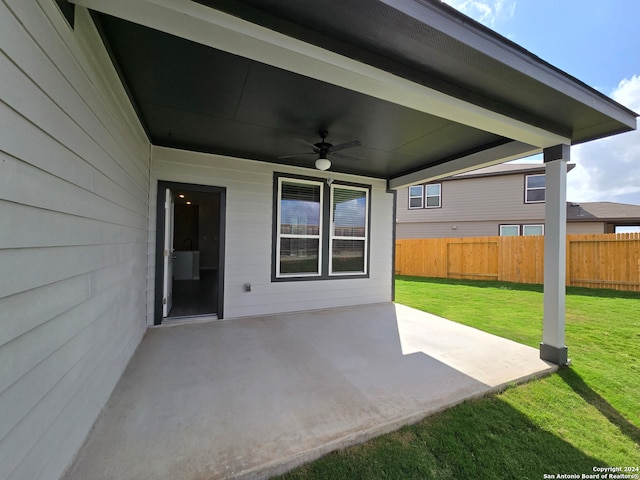 view of patio featuring ceiling fan