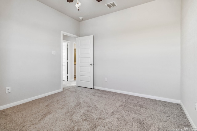 carpeted empty room with ceiling fan