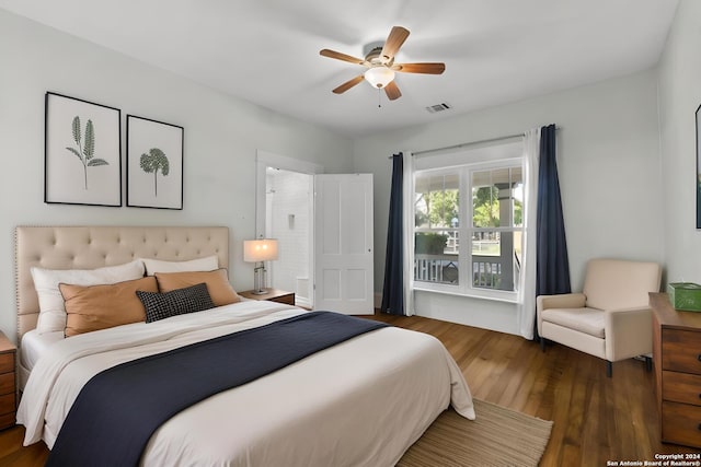 bedroom featuring dark hardwood / wood-style floors and ceiling fan