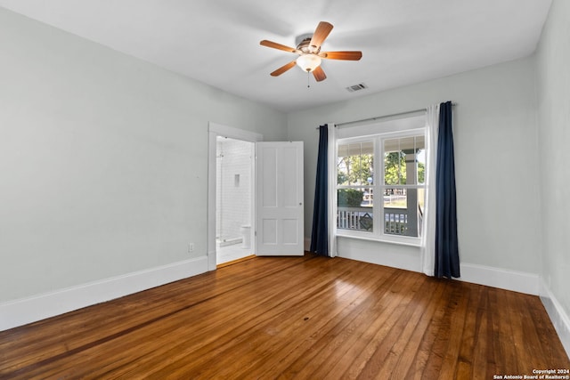 spare room featuring ceiling fan and wood-type flooring