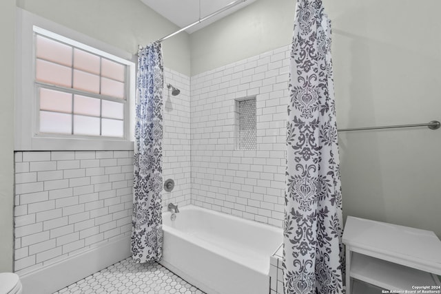 214 Loretta Pl, San Antonio, TX 78210 - bathroom featuring shower / bath combination with curtain and toilet
