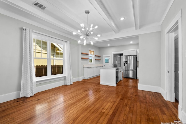 214 Loretta Pl, San Antonio, TX 78210 - unfurnished living room with a chandelier, dark wood-style flooring, beam ceiling, baseboards, and recessed lighting