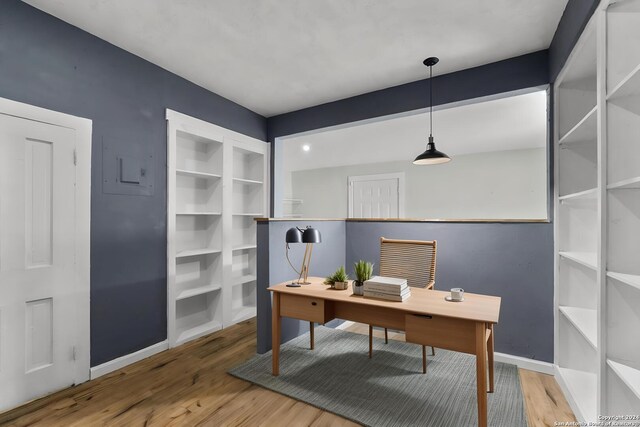 home office featuring hardwood / wood-style flooring