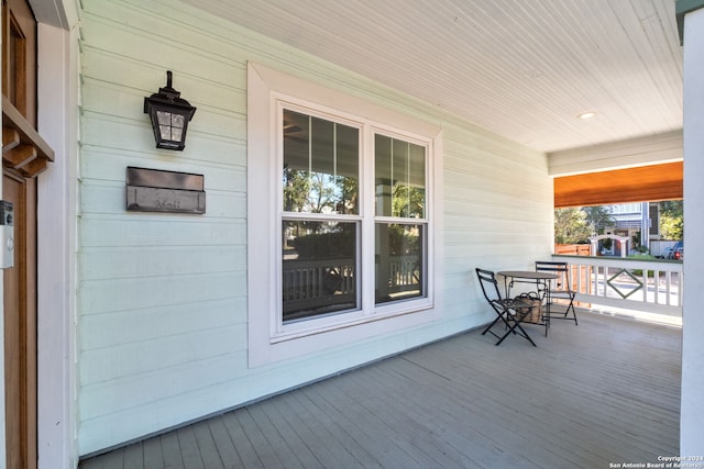 wooden deck with a porch