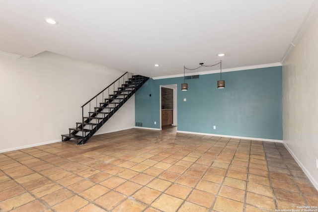 unfurnished living room with ornamental molding