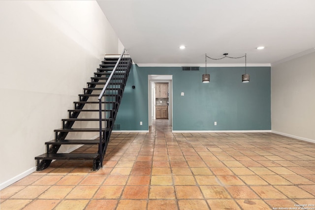 interior space featuring crown molding