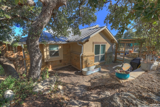 rear view of house featuring a patio area