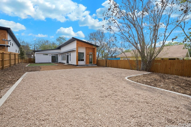 rear view of house with a patio