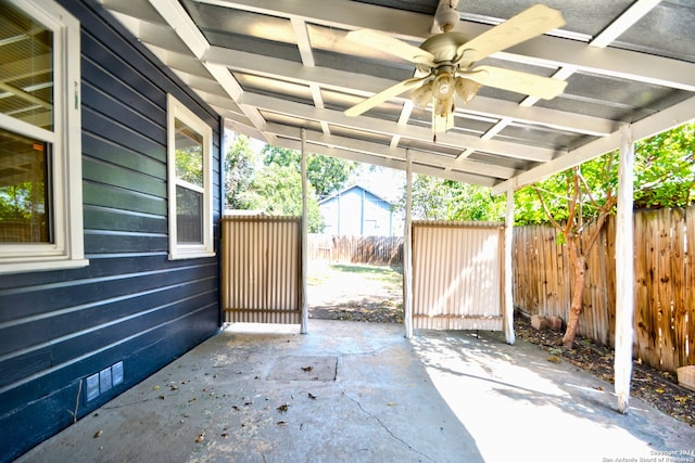 view of patio featuring ceiling fan