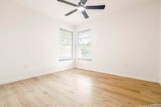 unfurnished room with light hardwood / wood-style floors and ceiling fan