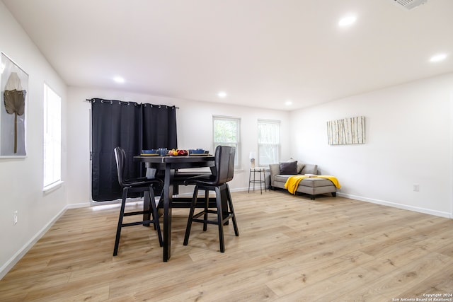 dining room with light hardwood / wood-style flooring