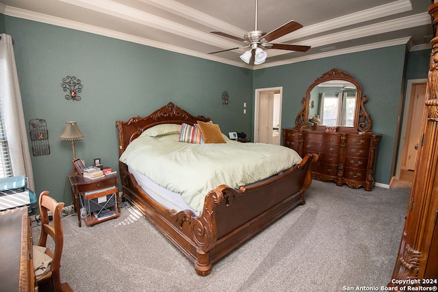 bedroom featuring carpet floors, ceiling fan, and crown molding