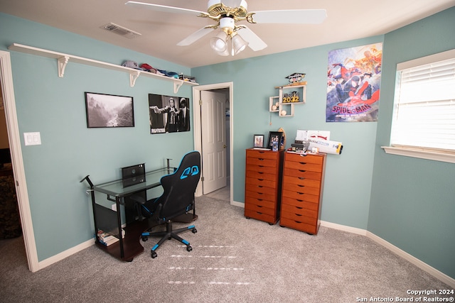 office featuring light carpet and ceiling fan