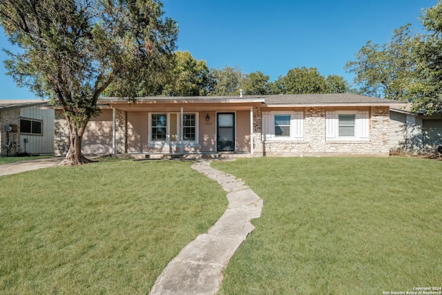 ranch-style house with a front lawn