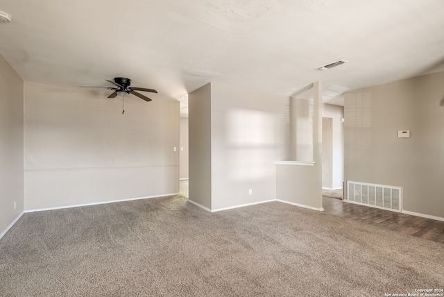 spare room featuring carpet floors and ceiling fan