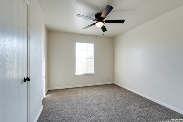 unfurnished room featuring carpet flooring and ceiling fan