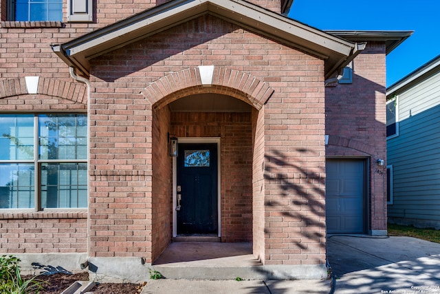 entrance to property with a garage