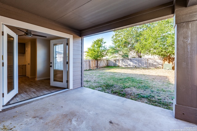 exterior space with a patio and ceiling fan