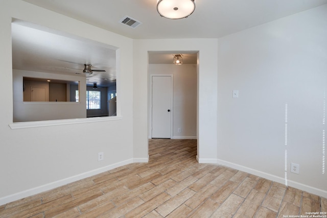 7419 Cedar Farm, San Antonio, TX 78239 - unfurnished room featuring baseboards, a ceiling fan, wood finished floors, and visible vents