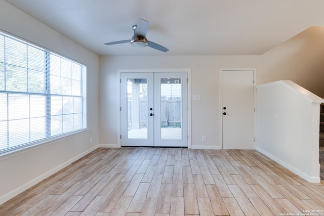 7419 Cedar Farm, San Antonio, TX 78239 - interior space featuring baseboards, a ceiling fan, french doors, and light wood-type flooring