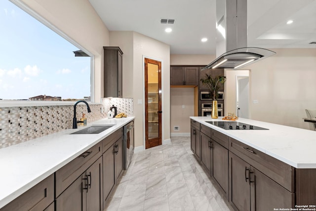 kitchen with island range hood, black electric stovetop, dishwasher, sink, and tasteful backsplash