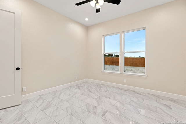 unfurnished room featuring ceiling fan