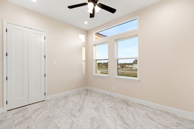 empty room with ceiling fan