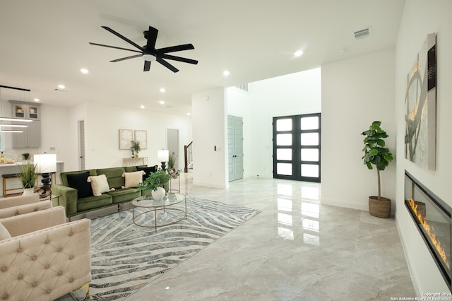 living room with ceiling fan