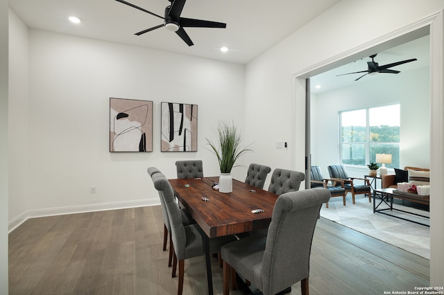 dining room featuring ceiling fan and hardwood / wood-style floors