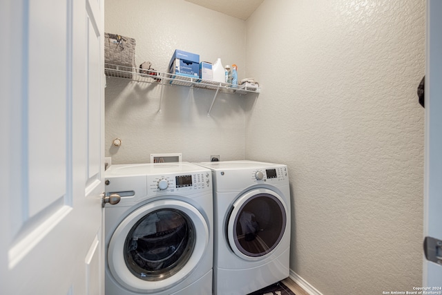 laundry room with washer and clothes dryer