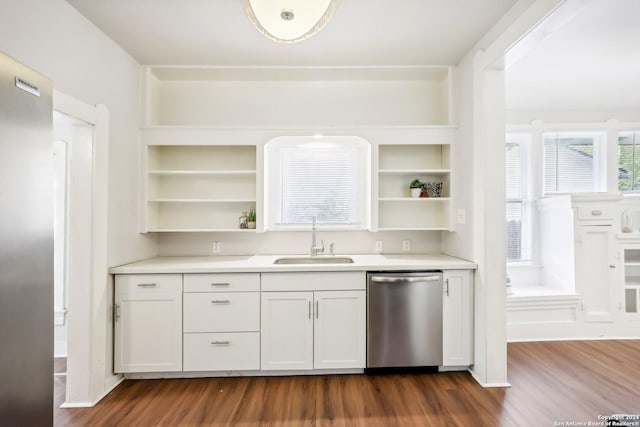 1112 W Huisache Ave, San Antonio, TX 78201 - kitchen with open shelves, a sink, light countertops, dark wood finished floors, and stainless steel dishwasher
