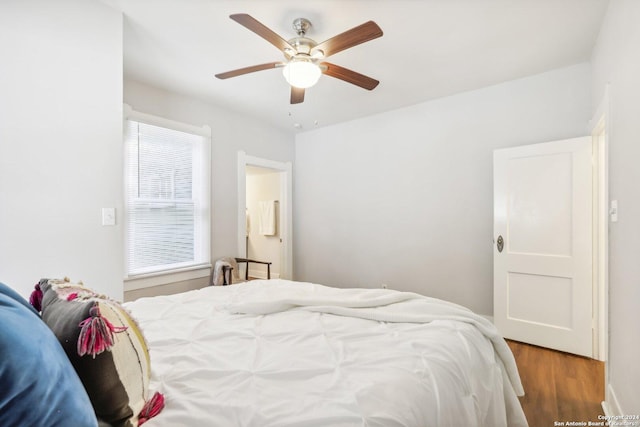 1112 W Huisache Ave, San Antonio, TX 78201 - bedroom featuring a ceiling fan and wood finished floors