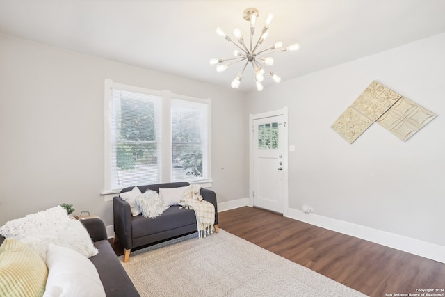 interior space with hardwood / wood-style floors and a chandelier