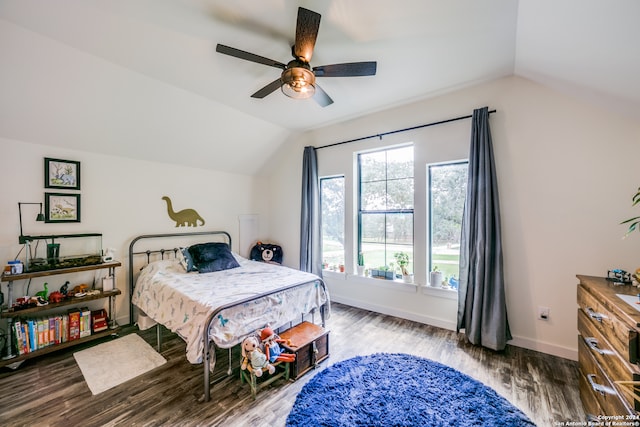 bedroom with vaulted ceiling, hardwood / wood-style flooring, and ceiling fan