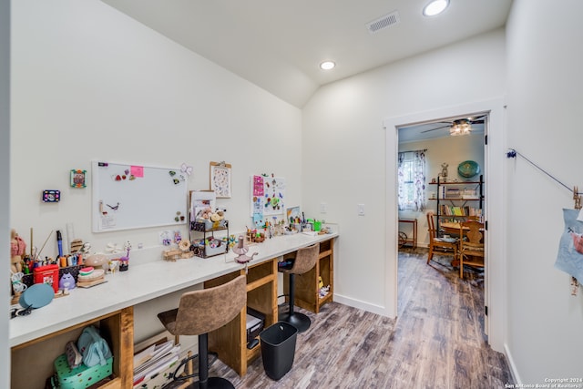 interior space featuring ceiling fan, hardwood / wood-style flooring, and lofted ceiling