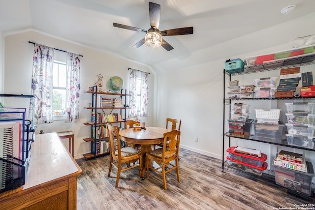 dining space with hardwood / wood-style floors, ceiling fan, plenty of natural light, and vaulted ceiling