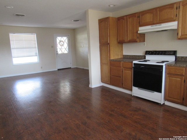 kitchen with white range with electric stovetop and dark wood-type flooring