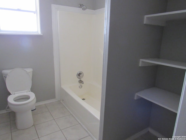 bathroom with toilet, shower / bath combination, and tile patterned flooring