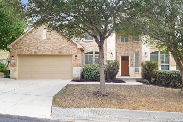 view of front of home with a garage