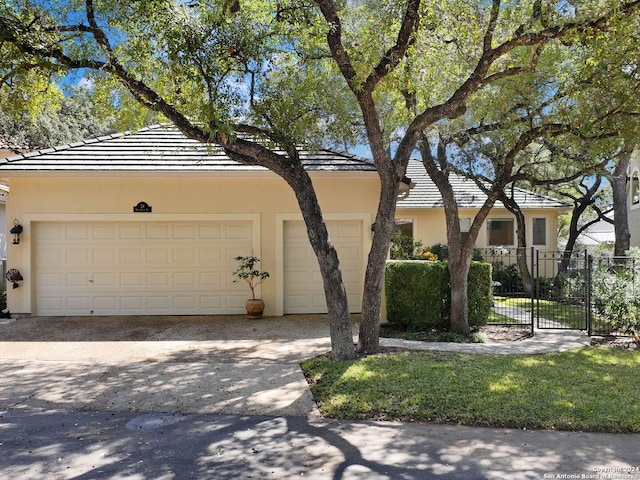 view of front of property featuring a garage