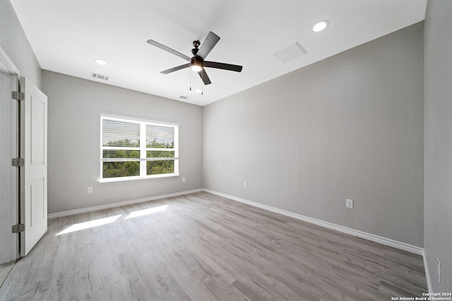 unfurnished bedroom with light hardwood / wood-style floors and ceiling fan