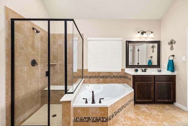 bathroom featuring vanity, tile patterned floors, and separate shower and tub