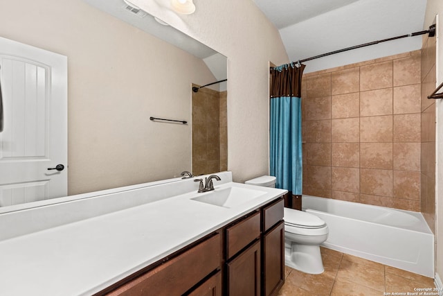 full bathroom featuring toilet, tile patterned flooring, vanity, and shower / tub combo