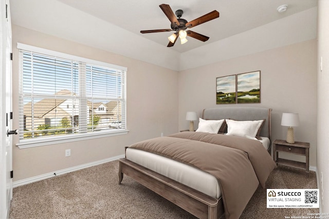 carpeted bedroom with ceiling fan