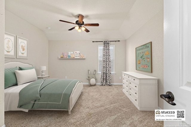 carpeted bedroom with lofted ceiling and ceiling fan