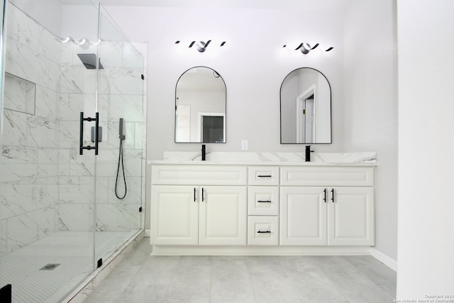 bathroom with vanity, walk in shower, and tile patterned floors