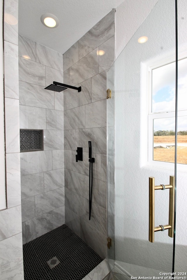 bathroom with walk in shower